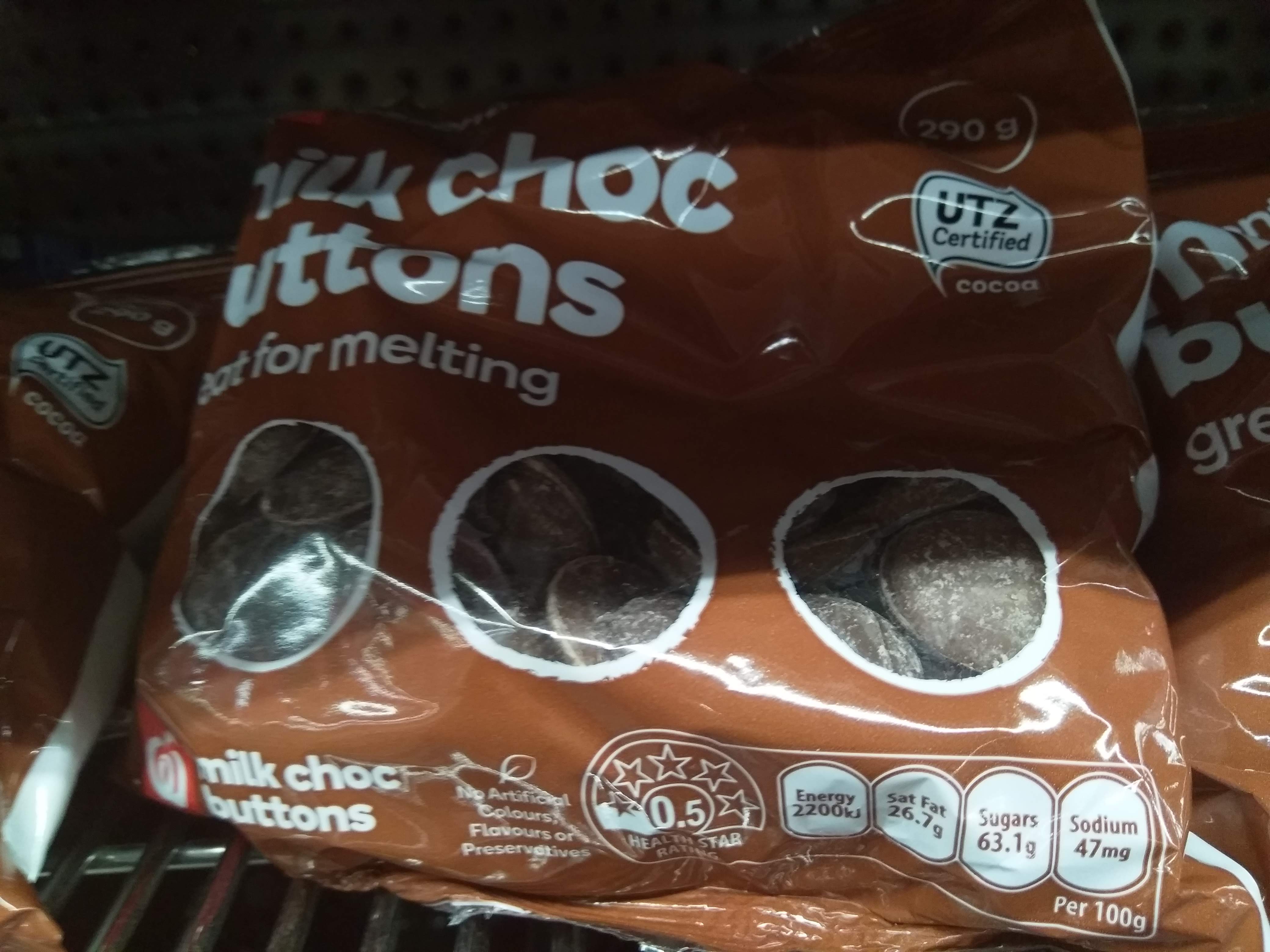 Countdown Essentials milk chocolate buttons - the UTZ logo is in white at the top right of the pack